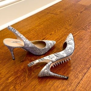 Beautiful black and white snakeskin sling backs. Size 7.5